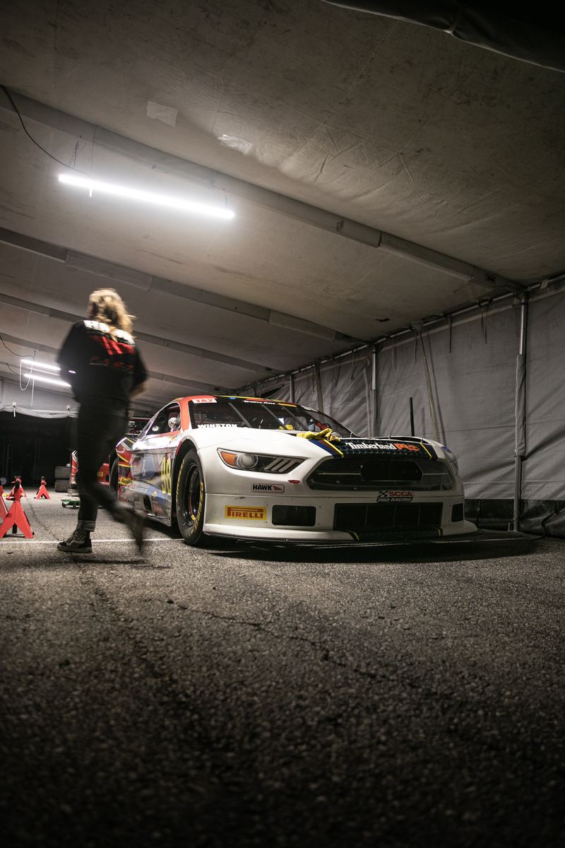 GT4 race car in the paddock tent between sessions