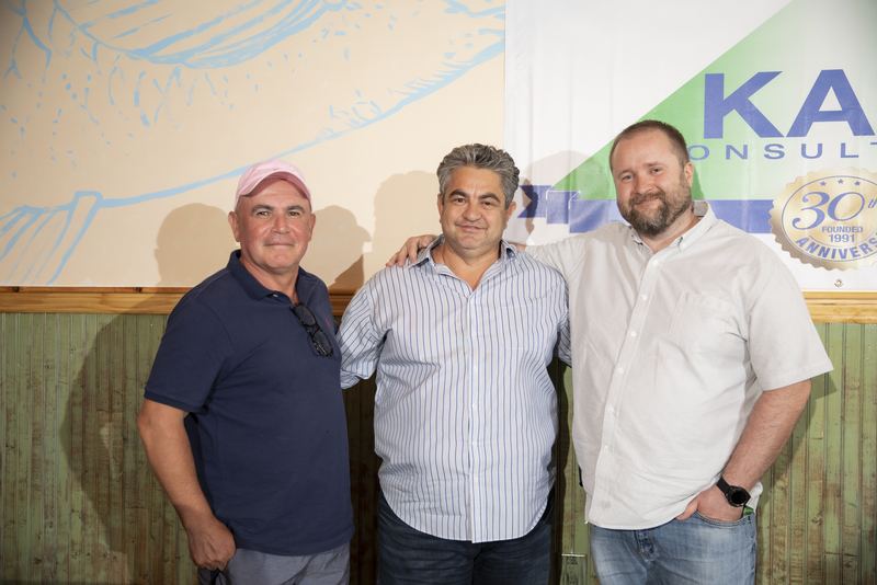 Colleagues together at a company 30th-anniversary celebration