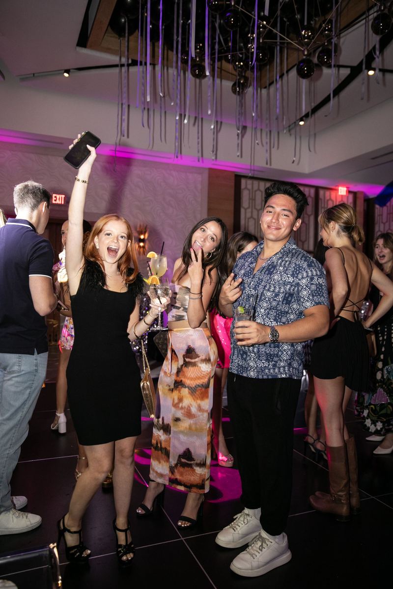 Event photography on Long Island: guests celebrating on a lit dance floor