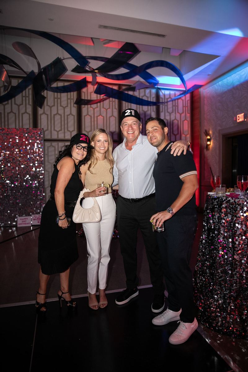 Guests posing together at a 21st birthday party